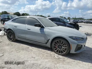 2023 BMW i4 M50 with VIN WBY33AW04PFP53795, listed as a Copart auction lot 42402505 with 20,210 mi miles and Salvage Title. Bid and sale history available at carsss.com. Image 4.