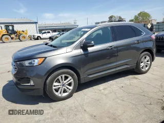 2020 Ford Edge SEL с VIN 2FMPK3J99LBB27190, выставлен на аукционе Copart как лот 52044755 с пробегом 28 339 миль миль и Списание • Salvage title. История ставок и продаж доступна на DreamBid. Изображение 1.