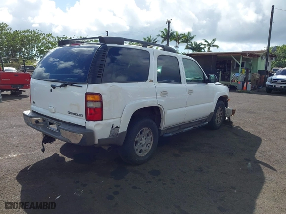 2003 Chevrolet Tahoe Z71 with VIN 1GNEK13T53R109296, listed as a IAAI auction lot 41659341 with 223,479 mi miles. Bid and sale history available at carsss.com. Image 4.