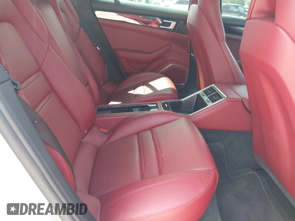2018 Porsche Panamera 4 E-Hybrid z VIN WP0AE2A7XJL174378, wystawiony jako IAAI lot #42303125 z przebiegiem 35 636 mil mil oraz . Historia ofert i sprzedaży dostępna na DreamBid. Obrazek 8.