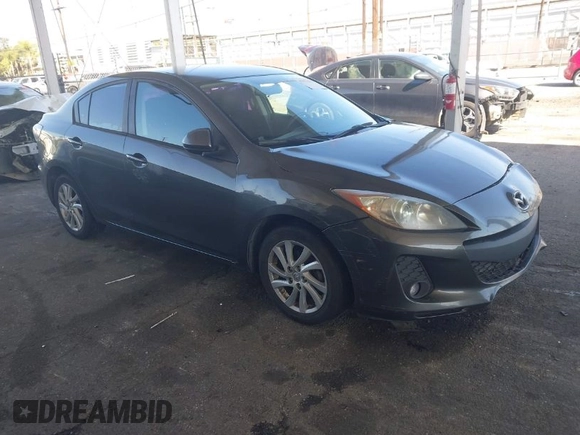 2012 Mazda Mazda3 i Touring with VIN JM1BL1V89C1545584, listed as a IAAI auction lot 41953481 with 190,831 mi miles. Bid and sale history available at carsss.com. Image 1.