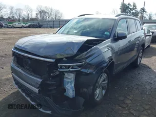 2021 Volkswagen Atlas SE z VIN 1V2WR2CA0MC585259, wystawiony jako IAAI lot #41525783 z przebiegiem 80 101 mil mil oraz . Historia ofert i sprzedaży dostępna na DreamBid. Obrazek 2.
