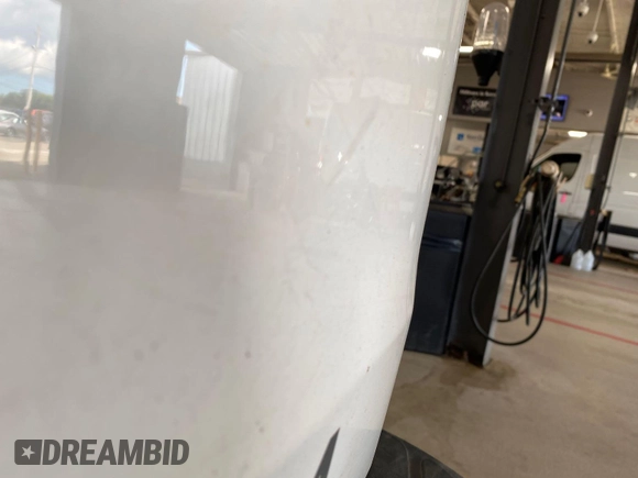 2014 Chevrolet Express Cargo with VIN 1GCWGFCA2E1184095, listed as a IAAI auction lot 42725036 with 270,636 mi miles and . Bid and sale history available at DreamBid. Image 3.