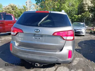2014 Kia Sorento LX with VIN 5XYKTCA63EG506217, listed as a IAAI auction lot 42050413 with 126,806 mi miles and . Bid and sale history available at carsss.com. Image 16.
