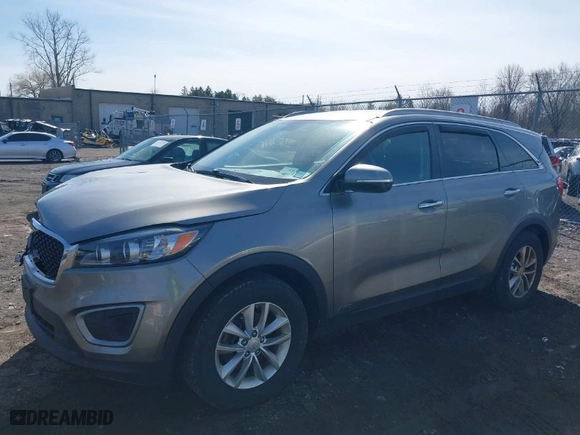 2017 Kia Sorento LX with VIN 5XYPGDA3XHG244089, listed as a IAAI auction lot 41956816 with 79,015 mi miles. Bid and sale history available at carsss.com. Image 2.