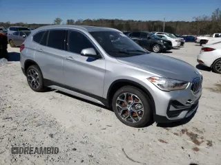 2021 BMW X1 xDrive28i with VIN WBXJG9C08M5T66350, listed as a Copart auction lot 43966353 with 1,721 mi miles. Bid and sale history available at carsss.com. Image 4.