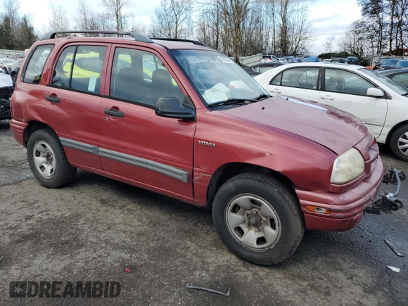 2000 Suzuki Vitara JX z VIN 2S3TD52V9Y6100173, wystawiony jako Copart lot #86200824 z przebiegiem Nie podano mil oraz Szkody całkowita. Historia ofert i sprzedaży dostępna na DreamBid. Obrazek 4.