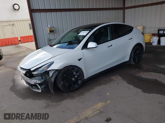 2023 Tesla Model Y Long Range with VIN 7SAYGAEE0PF787216, listed as a IAAI auction lot 41589954 with 17,985 mi miles and . Bid and sale history available at DreamBid. Image 2.