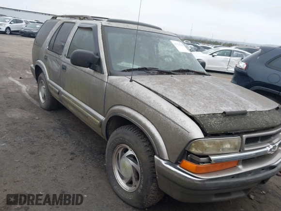 2000 Chevrolet Blazer LT z VIN 1GNDT13WXY2214421, wystawiony jako IAAI lot #41525220 z przebiegiem Nie podano mil oraz . Historia ofert i sprzedaży dostępna na DreamBid. Obrazek 1.