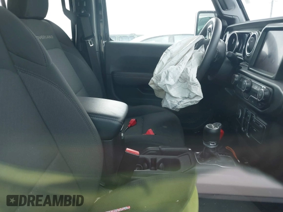 2023 Jeep Gladiator Overland z VIN 1C6HJTFG2PL523686, wystawiony jako IAAI lot #42134627 z przebiegiem 33 575 mil mil oraz . Historia ofert i sprzedaży dostępna na DreamBid. Obrazek 5.