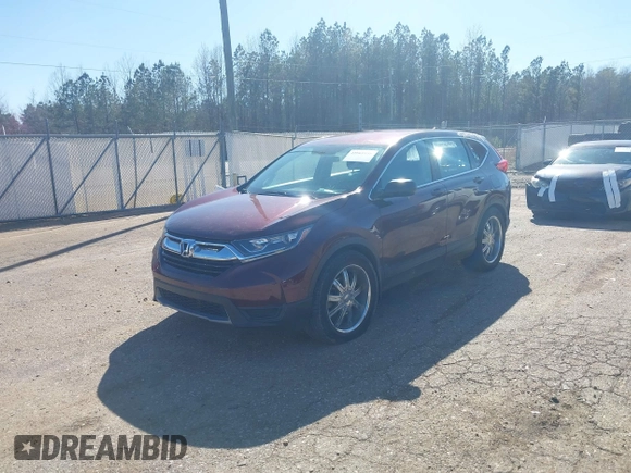 2019 Honda CR-V LX with VIN 2HKRW5H30KH414385, listed as a IAAI auction lot 41869188 with 91,473 mi miles and . Bid and sale history available at DreamBid. Image 2.