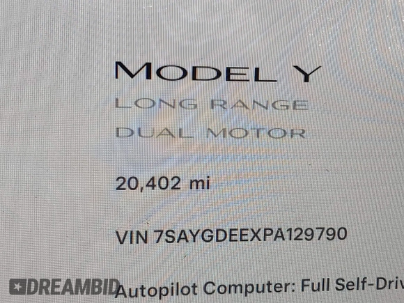 2023 Tesla Model Y Long Range with VIN 7SAYGDEEXPA129790, listed as a IAAI auction lot 41735721 with 20,402 mi miles and . Bid and sale history available at DreamBid. Image 16.