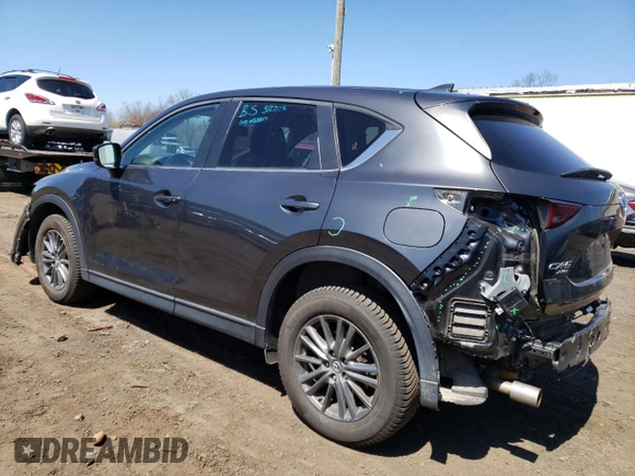 2017 Mazda CX-5 Touring with VIN JM3KFBCL3H0202598, listed as a Copart auction lot 52184325 with 77,740 mi miles and Salvage Title. Bid and sale history available at carsss.com. Image 2.