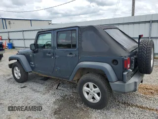 2007 Jeep Wrangler Unlimited X with VIN 1J4GA39117L119395, listed as a Copart auction lot 52588055 with 160,335 mi miles and Salvage title. Bid and sale history available at DreamBid. Image 2.