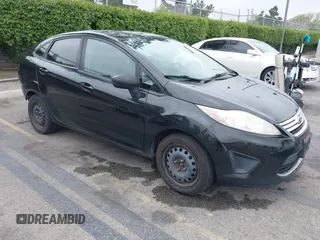 2011 Ford Fiesta SE with VIN 3FADP4BJ3BM116745, listed as a IAAI auction lot 42087952 with 236,024 mi miles. Bid and sale history available at carsss.com. Image 1.