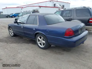 2003 Mercury Marauder with VIN 2MEHM75V33X674412, listed as a IAAI auction lot 41879734 with 181,984 mi miles. Bid and sale history available at carsss.com. Image 3.