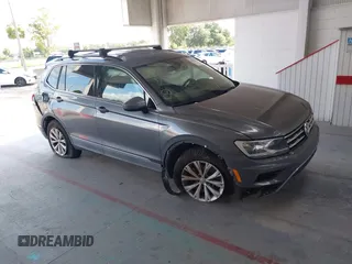 2018 Volkswagen Tiguan SEL with VIN 3VV3B7AXXJM213579, listed as a IAAI auction lot 42664339 with 84,676 mi miles and . Bid and sale history available at DreamBid. Image 1.