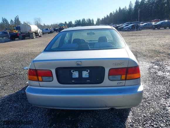 1997 Honda Civic DX with VIN 1HGEJ6223VL095214, listed as a IAAI auction lot 41560717 with 257,409 mi miles. Bid and sale history available at carsss.com. Image 16.