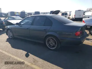 2000 BMW 5 Series 540i with VIN WBADN5341YGC94123, listed as a Copart auction lot 83599214 with 138,932 mi miles and Salvage Title. Bid and sale history available at carsss.com. Image 2.