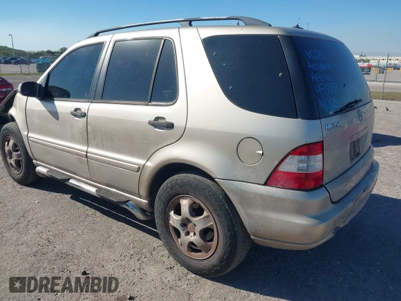 2003 Mercedes-Benz M 350 with VIN 4JGAB57E23A453057, listed as a IAAI auction lot 41704721 with 190,649 mi miles and . Bid and sale history available at DreamBid. Image 3.