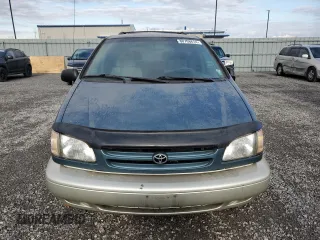 2000 Toyota Sienna LE with VIN 4T3ZF13C9YU280798, listed as a Copart auction lot 80708614 with 282,612 mi miles and Clean Title. Bid and sale history available at carsss.com. Image 5.