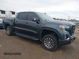 2021 GMC Sierra 1500 AT4 with VIN 1GTP9EED8MZ391803, listed as a IAAI auction lot 41275238 with 84,024 mi miles. Bid and sale history available at carsss.com. Image 1.