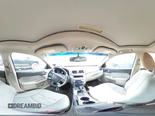 2010 Ford Fusion SE with VIN 3FAHP0HA2AR304143, listed as a Copart auction lot 56181895 with 136,936 mi miles and Salvage title. Bid and sale history available at DreamBid. Image 14.