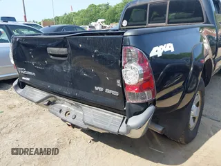 2013 Toyota Tacoma with VIN 3TMMU4FNXDM057020, listed as a IAAI auction lot 42560987 with 177,333 mi miles and . Bid and sale history available at DreamBid. Image 6.
