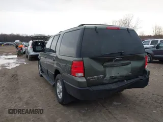 2004 Ford Expedition Special Service with VIN 1FMPU16L64LB74097, listed as a IAAI auction lot 41938850 with 168,436 mi miles. Bid and sale history available at carsss.com. Image 3.