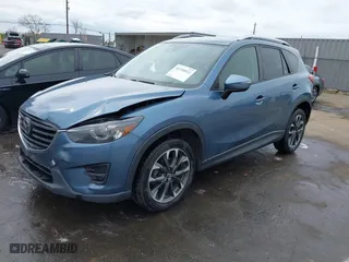 2016 Mazda CX-5 Grand Touring with VIN JM3KE4DY9G0726782, listed as a IAAI auction lot 41720512 with NaN miles. Bid and sale history available at carsss.com. Image 17.