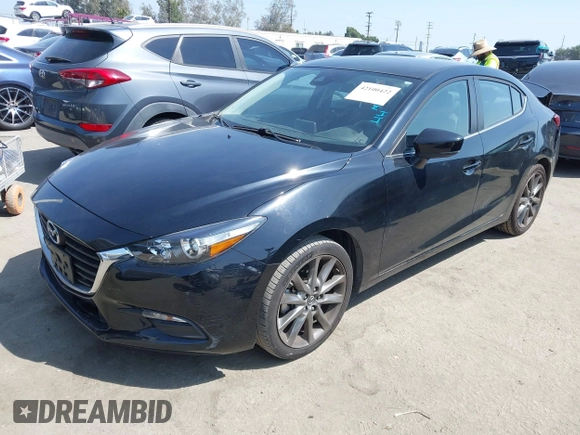 2018 Mazda 3 Touring z VIN 3MZBN1V33JM276803, wystawiony jako IAAI lot #42100422 z przebiegiem 41 802 mil mil oraz . Historia ofert i sprzedaży dostępna na DreamBid. Obrazek 20.