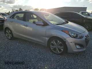 2013 Hyundai Elantra GT with VIN KMHD35LE7DU090495, listed as a Copart auction lot 77133264 with 118,660 mi miles and Salvage Title. Bid and sale history available at carsss.com. Image 4.