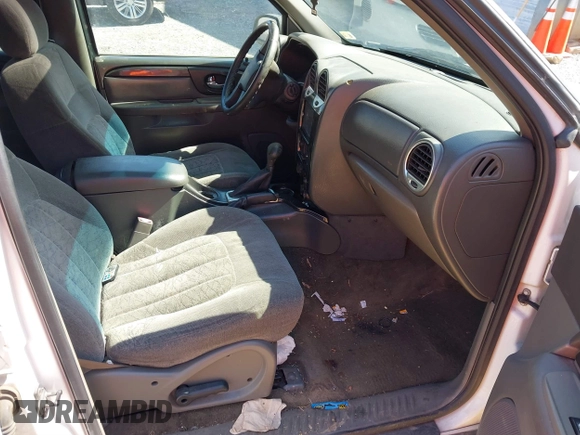 2004 GMC Envoy SLE with VIN 1GKDT13S442223832, listed as a IAAI auction lot 41845628 with 265,898 mi miles. Bid and sale history available at carsss.com. Image 5.