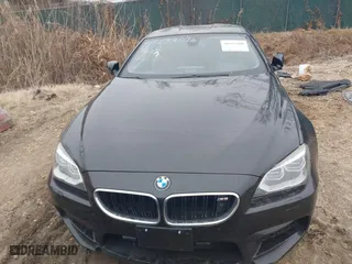 2014 BMW M6 with VIN WBSLX9C58ED160558, listed as a IAAI auction lot 41553209 with 154,789 mi miles. Bid and sale history available at carsss.com. Image 13.