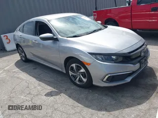 2019 Honda Civic Sedan LX with VIN 2HGFC2F61KH536965, listed as a IAAI auction lot 42030634 with 1 mi miles. Bid and sale history available at carsss.com. Image 1.
