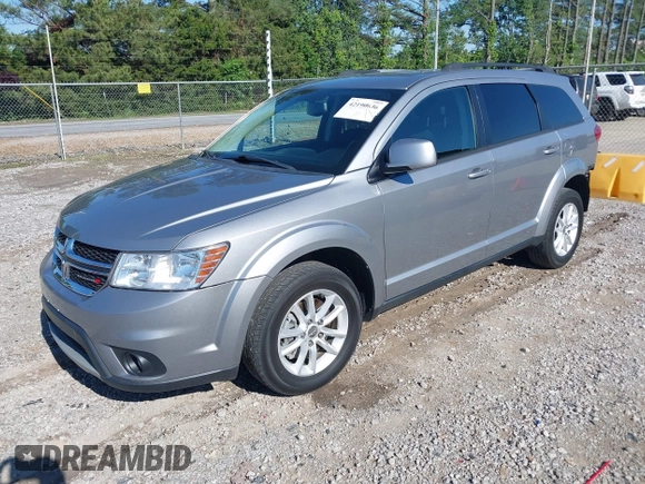 2017 Dodge Journey SXT z VIN 3C4PDCBG4HT563310, wystawiony jako IAAI lot #42190636 z przebiegiem 171 054 mil mil oraz . Historia ofert i sprzedaży dostępna na DreamBid. Obrazek 2.