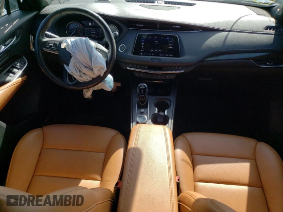 2021 Cadillac XT4 AWD Premium Luxury with VIN 1GYFZDR41MF002835, listed as a Copart auction lot 49384424 with 9,984 mi miles and Salvage Title. Bid and sale history available at carsss.com. Image 8.