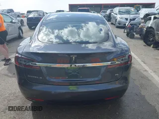 2016 Tesla Model S 70 with VIN 5YJSA1E14GF157118, listed as a IAAI auction lot 41794381 with 53,651 mi miles and . Bid and sale history available at DreamBid. Image 17.