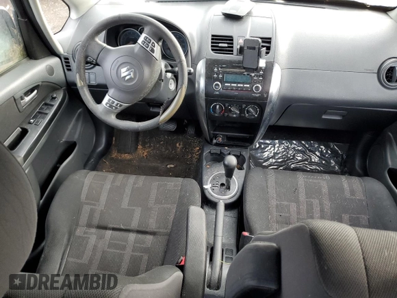 2012 Suzuki SX4 LE with VIN JS2YC5A35C6303573, listed as a Copart auction lot 84844564 with 0 mi miles and Clean Title. Bid and sale history available at carsss.com. Image 8.