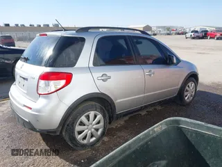 2010 Suzuki SX4 with VIN JS2YA5A30A6301412, listed as a IAAI auction lot 40599958 with 123,177 mi miles. Bid and sale history available at carsss.com. Image 4.