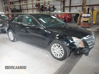 2011 Cadillac CTS Luxury with VIN 1G6DG5EYXB0145058, listed as a IAAI auction lot 41973156 with 143,246 mi miles and . Bid and sale history available at carsss.com. Image 1.