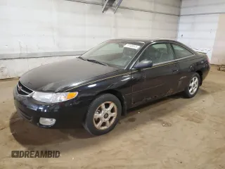 1999 Toyota Solara SE z VIN 2T1CF22P5XC230117, wystawiony jako Copart lot #57488925 z przebiegiem 282 366 mil mil oraz Czysty tytuł • Clean title. Historia ofert i sprzedaży dostępna na DreamBid. Obrazek 1.