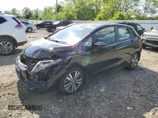 2015 Honda Fit EX-L z VIN 3HGGK5H88FM705989, wystawiony jako Copart lot #57143835 z przebiegiem 132 747 mil mil oraz Szkoda całkowita • Salvage title. Historia ofert i sprzedaży dostępna na DreamBid. Obrazek 1.
