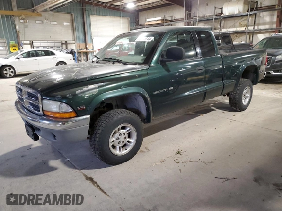 1999 Dodge Dakota SLT with VIN 1B7GG22Y9XS299933, listed as a Copart auction lot 82360644 with 146,506 mi miles and Clean Title. Bid and sale history available at DreamBid. Image 1.