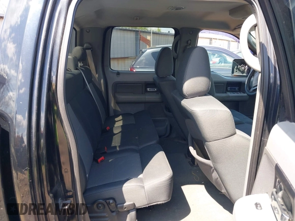 2007 Ford F-150 XLT with VIN 1FTPW14V67KC70678, listed as a IAAI auction lot 42002237 with 309,291 mi miles. Bid and sale history available at carsss.com. Image 8.