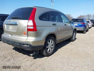 2008 Honda CR-V EX with VIN JHLRE38598C014034, listed as a IAAI auction lot 41678378 with 142,561 mi miles. Bid and sale history available at carsss.com. Image 4.