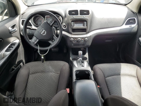 2014 Dodge Journey American Value with VIN 3C4PDCAB1ET135504, listed as a Copart auction lot 58803645 with 164,501 mi miles and Clean title. Bid and sale history available at DreamBid. Image 8.