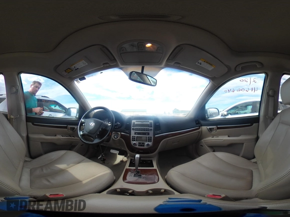 2007 Hyundai Santa Fe SE z VIN 5NMSH73E87H051418, wystawiony jako IAAI lot #41606640 z przebiegiem 185 407 mil mil oraz . Historia ofert i sprzedaży dostępna na DreamBid. Obrazek 19.