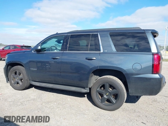 2020 Chevrolet Tahoe LT with VIN 1GNSCBKC4LR246060, listed as a IAAI auction lot 41272902 with 105,417 mi miles and . Bid and sale history available at DreamBid. Image 13.