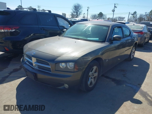 2010 Dodge Charger SXT with VIN 2B3CA3CV6AH185978, listed as a IAAI auction lot 41661822 with 166,601 mi miles. Bid and sale history available at carsss.com. Image 2.